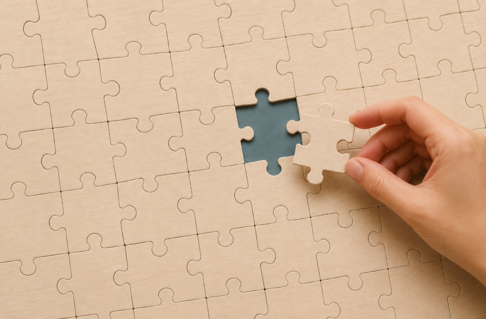Wooden puzzle representing thoughtful family vacation planning.